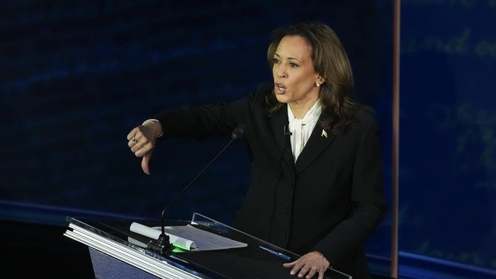 This combination of photos shows Republican presidential nominee former President Donald Trump, left, and Democratic presidential nominee Vice President Kamala Harris during an ABC News presidential debate at the National Constitution Center, Tuesday, Sept. 10, 2024, in Philadelphia. (AP Photo/Alex Brandon)