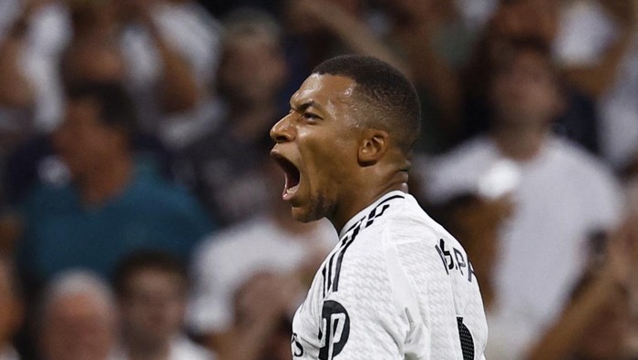Soccer Football - LaLiga - Real Madrid v Real Betis - Santiago Bernabeu, Madrid, Spain - September 1, 2024  Real Madrids Kylian Mbappe celebrates scoring their second goal REUTERS/Susana Vera
