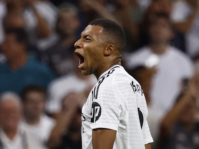 Kylian Mbappe Soccer Football - LaLiga - Real Madrid v Real Betis - Santiago Bernabeu, Madrid, Spain - September 1, 2024 Real Madrids Kylian Mbappe celebrates scoring their second goal REUTERS/Susana Vera