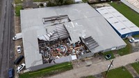 Pemandangan drone menunjukkan toko barang bekas Junk In The Trunk, yang mengalami kerusakan, di Houma, Louisiana, AS, Kamis (12/9/2024).  
