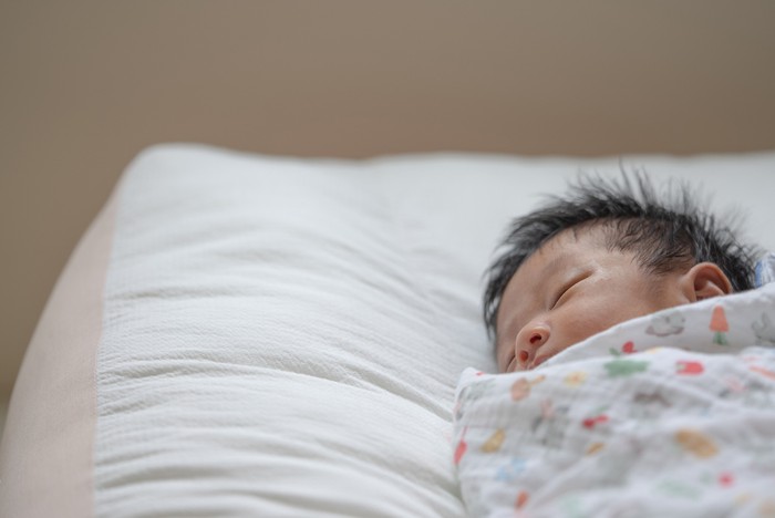 Ilustrasi Bantal untuk Bayi Baru Lahir