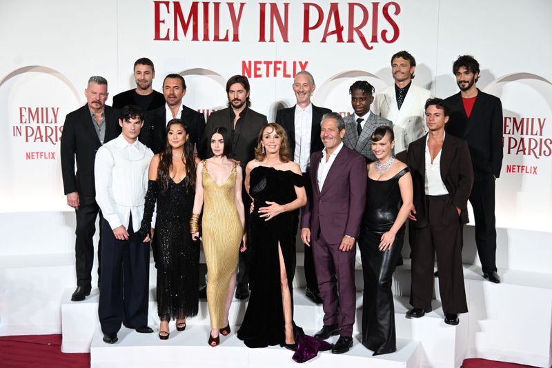 Pemain Emily In Paris Season 4 The cast (William Abadie, Lucas Bravo, Bruno Gouery, Camille Razat, Eugenio Franceschini, Paul Forman, Ashley Park, Lily Collins, Philippine Leroy-Beaulieu, Samuel Arnold, Marylin Fitoussi, Ted Sarandos, Darren Star) on the red carpet of Netflix series Emily in Paris 4 at The Space Cinema Moderno. Rome (Italy), September 10th, 2024 (Photo by Massimo Insabato/Archivio Massimo Insabato/Mondadori Portfolio via Getty Images)
