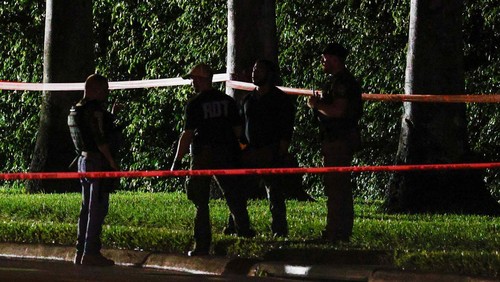 A law enforcement officer walks after reports of shots fired outside Republican presidential nominee and former U.S. President Donald Trumps Trump International Golf Club in West Palm Beach, Florida, U.S. September 15, 2024.  REUTERS/Marco Bello