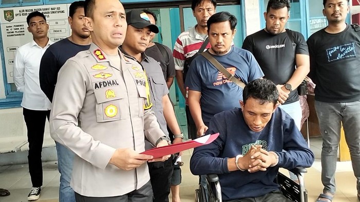 Pelaku saat mendapatkan perawatan di RSUD HAMS Kisaran usai ditembak kakinya saat ditangkap.
