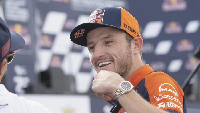 MISANO ADRIATICO, ITALY - SEPTEMBER 08:  Jack Miller of Australia and Bull KTM Factory Racing smiles during the MotoGP Rider Fan Parade during the MotoGP Of San Marino - Race at Misano World Circuit on September 08, 2024 in Misano Adriatico, Italy. (Photo by Mirco Lazzari gp/Getty Images)