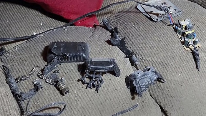 Setelah Pager, Kini Gelombang Ledakan Walkie-Talkie Guncang Lebanon This video grab shows a walkie-talkie that was exploded inside a house, in Baalbek, east Lebanon, Wednesday, Sept. 18, 2024. (AP Photo)