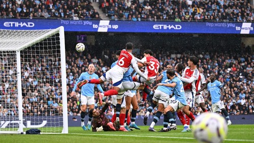MANCHESTER, ENGLAND - SEPTEMBER 22: Gabriel of Arsenal scores his teams second goal past Ederson of Manchester City during the Premier League match between Manchester City FC and Arsenal FC at Etihad Stadium on September 22, 2024 in Manchester, England. (Photo by David Price/Arsenal FC via Getty Images)