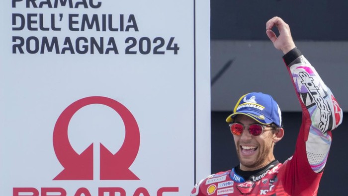 Italian rider Enea Bastianini of the Ducati Lenovo Team celebrates on the podium after winning the MotoGP race of the Emilia Romagna Motorcycle Grand Prix at the Misano circuit in Misano Adriatico, Italy, Sunday, Sept. 22, 2024. (AP Photo/Gregorio Borgia)