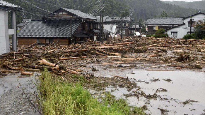 An aerial view taken by a helicopter shows a flooded residential area caused by torrential rain in Wajima, Ishikawa Prefecture, Japan September 21, 2024, in this photo taken by Kyodo. Mandatory credit Kyodo/via REUTERS   ATTENTION EDITORS - THIS IMAGE HAS BEEN SUPPLIED BY A THIRD PARTY. MANDATORY CREDIT. JAPAN OUT. NO COMMERCIAL OR EDITORIAL SALES IN JAPAN.     TPX IMAGES OF THE DAY