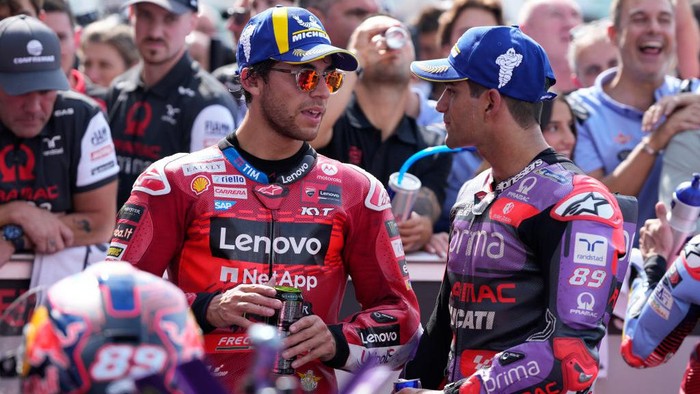 MISANO ADRIATICO, ITALY - SEPTEMBER 22: Enea Bastianini of Italy and Ducati Lenovo Team talk with Jorge Martin of Spain and Prima Pramac Racing at the end of the race of the MotoGP of Emilia Romagna at Misano World Circuit on September 22, 2024 in Misano Adriatico, Italy. (Photo by Danilo Di Giovanni/Getty Images)