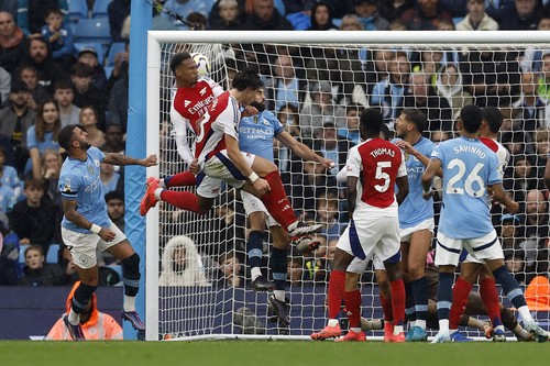 Soccer Football - Premier League - Manchester City v Arsenal - Etihad Stadium, Manchester, Britain - September 22, 2024 Arsenals Gabriel Magalhaes celebrates scoring their second goal Action Images via Reuters/Jason Cairnduff EDITORIAL USE ONLY. NO USE WITH UNAUTHORIZED AUDIO, VIDEO, DATA, FIXTURE LISTS, CLUB/LEAGUE LOGOS OR LIVE SERVICES. ONLINE IN-MATCH USE LIMITED TO 120 IMAGES, NO VIDEO EMULATION. NO USE IN BETTING, GAMES OR SINGLE CLUB/LEAGUE/PLAYER PUBLICATIONS. PLEASE CONTACT YOUR ACCOUNT REPRESENTATIVE FOR FURTHER DETAILS..