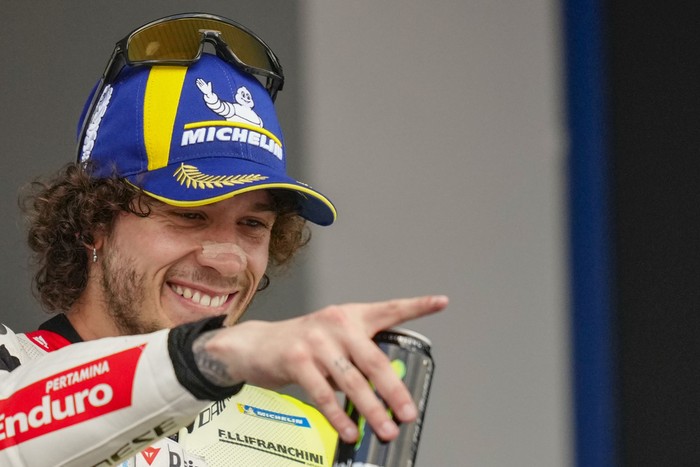 Third placed Italian rider Marco Bezzecchi of the Pertamina Enduro VR46 Racing Team celebrates after the MotoGP race of the Spanish Motorcycle Grand Prix at the Angel Nieto racetrack in Jerez de la Frontera, Spain, Sunday, April 28, 2024. (AP Photo/Jose Breton)