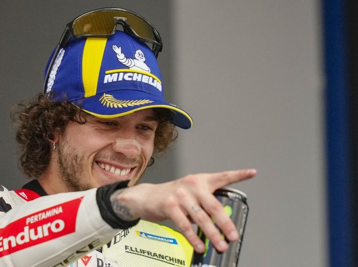 Third placed Italian rider Marco Bezzecchi of the Pertamina Enduro VR46 Racing Team celebrates after the MotoGP race of the Spanish Motorcycle Grand Prix at the Angel Nieto racetrack in Jerez de la Frontera, Spain, Sunday, April 28, 2024. (AP Photo/Jose Breton)