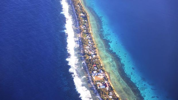 Aerial view of Funafuti, Tuvalu's most populous island, showing the port and main town of Fongafale, September 6, 2024. Picture taken through plane window. REUTERS/Kirsty Needham