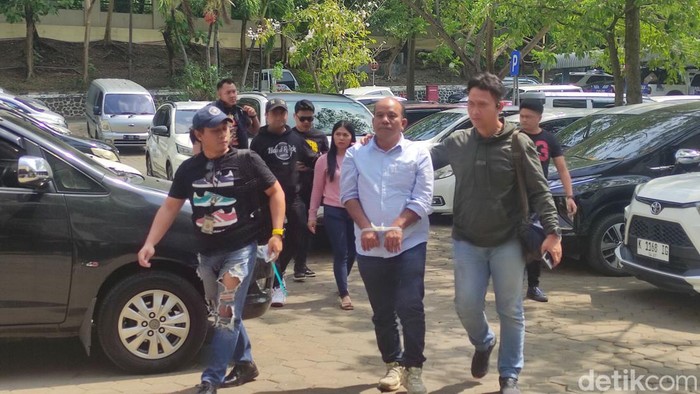 AM alias Anggiat Marpaung, bos debt collector (DC) yang jadi sempat buron saat dibawa ke Polda Jateng, Jumat (27/9/2024).