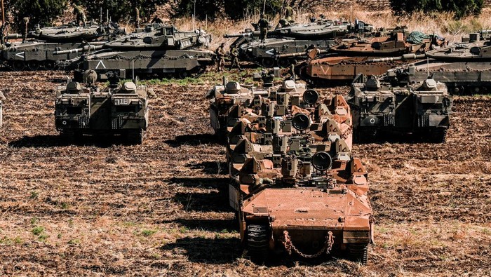 Israeli armoured military vehicles in formation, amid cross-border hostilities between?Hezbollah?and Israel, in northern Israel, September 27, 2024. REUTERS/Ayal Margolin ISRAEL OUT. NO COMMERCIAL OR EDITORIAL SALES IN ISRAEL