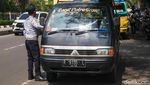 Priiit! Pelanggar Lalin Kena Tilang di Jalan Daan Mogot