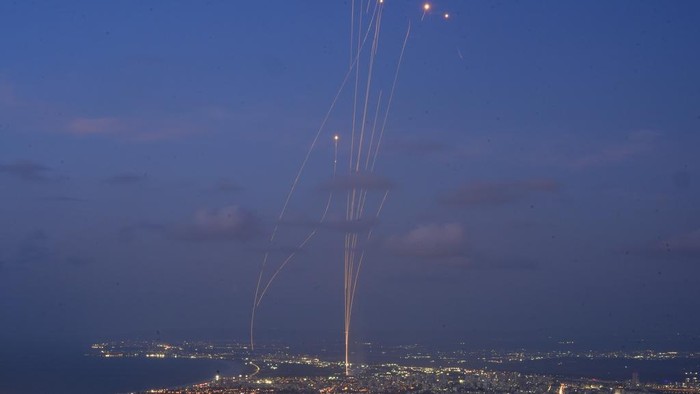 Israeli Iron Dome air defense system fires to intercept rockets that were launched from Lebanon, as seen from Haifa, northern Israel, Monday, Sept. 23, 2024. (AP Photo/Baz Ratner)