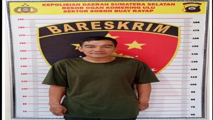 Pelaku Nain (46) saat diamankan di kantor polisi