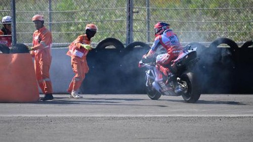 Gresini Racing MotoGPs Spanish rider Marc Marquez retires during the MotoGP race of the Indonesian Grand Prix at the Mandalika International Circuit in Mandalika, West Nusa Tenggara on September 29, 2024. (Photo by BAY ISMOYO / AFP)
