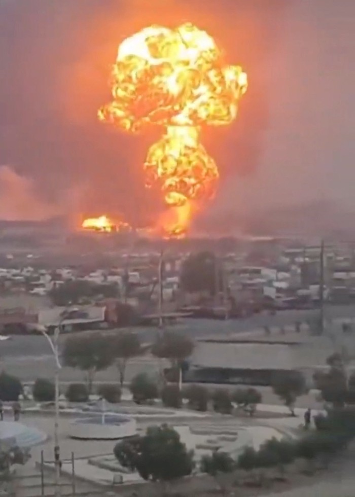 Smoke and fire are seen following Israeli strikes, in Hodeidah, Yemen, in this screengrab obtained from a social media video released on September 29, 2024. Social Media/via REUTERS  THIS IMAGE HAS BEEN SUPPLIED BY A THIRD PARTY. NO RESALES. NO ARCHIVES.