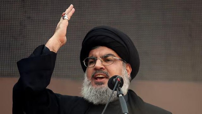 Lebanons Hezbollah leader Sayyed Hassan Nasrallah addresses his supporters during a religious procession to mark Ashura in Beiruts suburbs November 14, 2013. REUTERS/Khalil Hassan/File Photo Purchase Licensing Rights