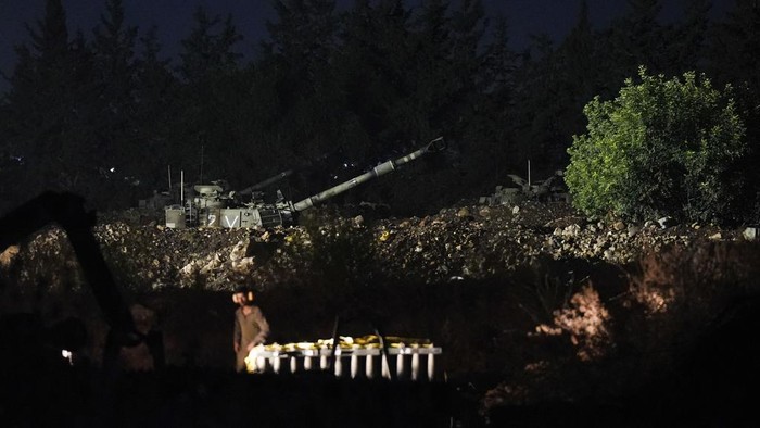 An Israeli mobile artillery unit fires a shell from northern Israel towards Lebanon, in a position near the Israel-Lebanon border, Monday, Sept. 30, 2024. (AP Photo/Baz Ratner)