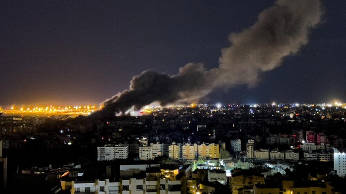Smoke rises from an Israeli airstrike that hit the southern suburb of Beirut, Lebanon, Tuesday, Oct. 1, 2024. (AP Photo/Hussein Malla)