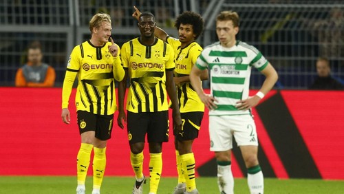 Soccer Football - Champions League - Borussia Dortmund v Celtic - Signal Iduna Park, Dortmund, Germany - October 1, 2024  Borussia Dortmunds Karim Adeyemi celebrates scoring their third goal with teammates REUTERS/Leon Kuegeler