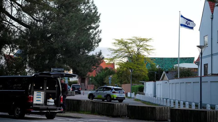A police vehicle is seen as police officers investigate two blasts near the Israeli embassy in Copenhagen, Denmark, October 2, 2024. Ritzau Scanpix/via REUTERS Purchase Licensing Rights