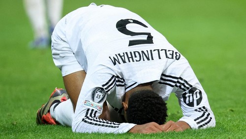 Real Madrids English midfielder #05 Jude Bellingham reacts during the UEFA Champions League football match between Lille LOSC and Real Madrid at the Pierre Mauroy Stadium in Villeneuve-dAscq, northern France, on October 2, 2024. (Photo by FRANCK FIFE / AFP)