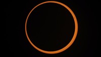 The moon moves across the sun during an annular solar eclipse seen from Tahai, Rapa Nui, or Easter Island, Chile, Wednesday, Oct. 2, 2024. (AP Photo/Esteban Felix)