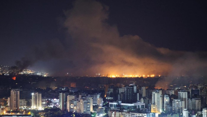 Smoke rises over Beiruts southern suburbs after a strike, amid ongoing hostilities between Hezbollah and Israeli forces, as seen from Sin El Fil, Lebanon, October 3, 2024. REUTERS/Amr Abdallah Dalsh