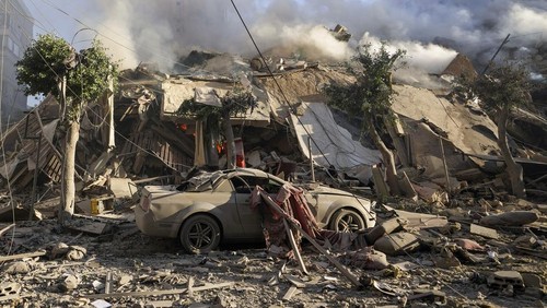 Smoke rises from the site of an Israeli airstrike in Dahiyeh, Beirut, Lebanon, Thursday, Oct. 3, 2024. (AP Photo/Hassan Ammar)