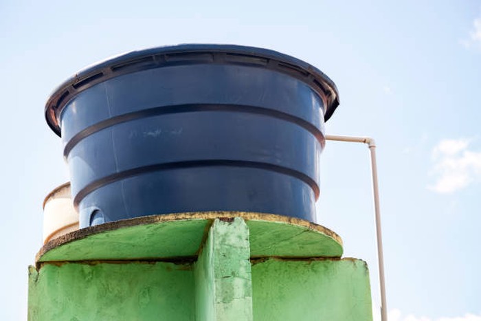 Blue plastic water tank used in residential constructions in Brazil