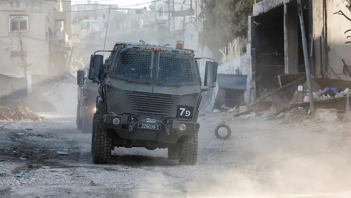 Israeli military vehicles operate during an Israeli raid in Tulkarm, in the Israeli-occupied West Bank, September 10, 2024. (Reuters)