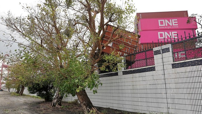 Fallen cargo containers are piled up after Typhoon Krathon made landfall in Kaohsiung, Taiwan October 4, 2024. REUTERS/Ann Wang
