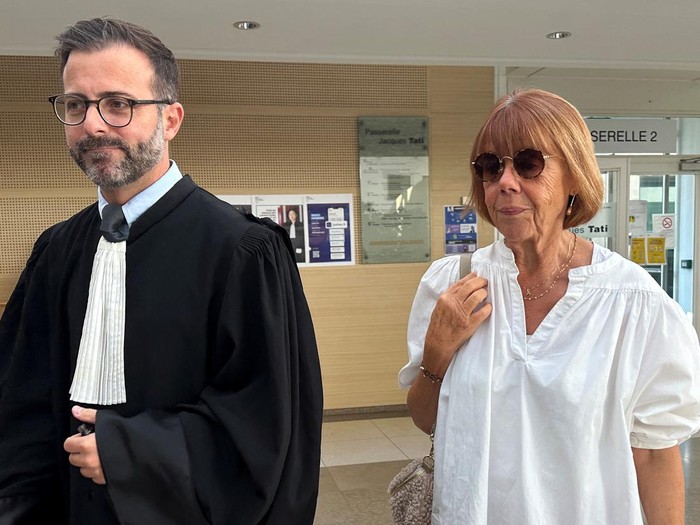 Gisele Pelicot, who has allegedly been drugged and raped by men solicited by her husband Dominique Pelicot, arrives with her lawyer Antoine Camus during the trial of her husband with 50 co-accused, at the courthouse in Avignon, France, September 19, 2024.  REUTERS/Antony Paone