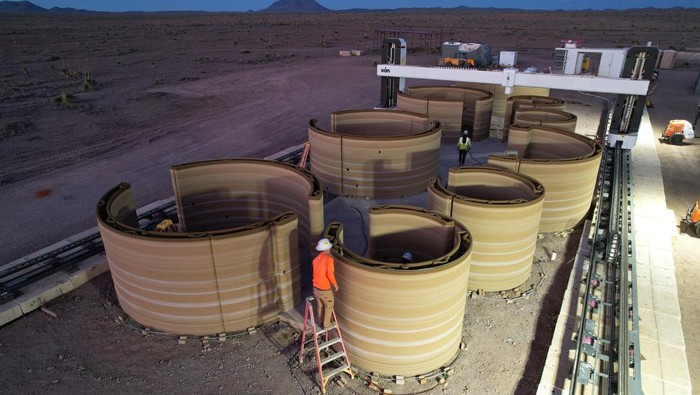 An aerial view of the first 3D-printed residential unit in foreground and first 3D-printed hotel unit in background of El Cosmico campground and hotel in Marfa, Texas, U.S., September 10, 2024. The project’s partners are calling it the first 3D-printed hotel in the world. REUTERS/Evan Garcia