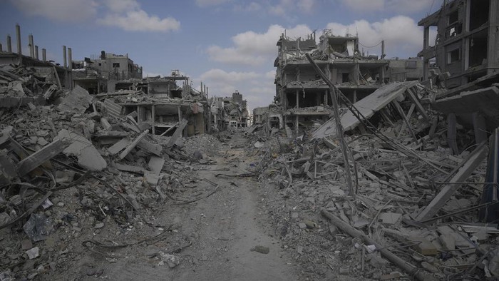A view of destroyed buildings is shown following Israeli strikes in the southern Gaza Strip on Friday, Sept. 13, 2024. (AP Photo/Leo Correa)
