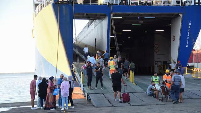 People wait at the port to board a ferry heading to Turkey, amid the ongoing hostilities between Hezbollah and Israeli forces, in Tripoli, northern Lebanon October 5, 2024. REUTERS/Omar Ibrahim/File Photo Purchase Licensing Rights