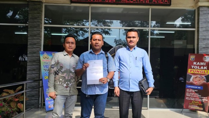 Kuasa Hukum Masinton-Mahfud laporkan wakil ketua DPRD Tapteng Camelia Neneng ke Polda Sumut. (Istimewa)