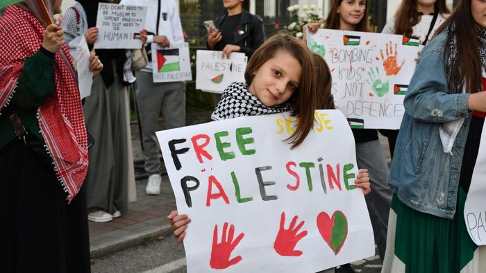 SKOPJE, NORTH MACEDONIA - OCTOBER 07: People take part in a demonstration in solidarity with the people of Palestine and Lebanon, which are under Israeli attacks in Skopje, North Macedonia on October 07, 2024. The demonstration was organized by students of the Cyril and Methodius University, the initiative in solidarity with Palestine and different groups. (Photo by Umeys Sulejman/Anadolu via Getty Images)