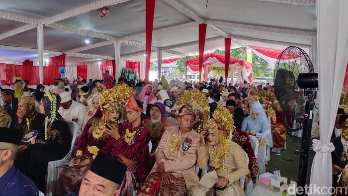 Suasana nikah massal yang digelar Pemkot Palembang.