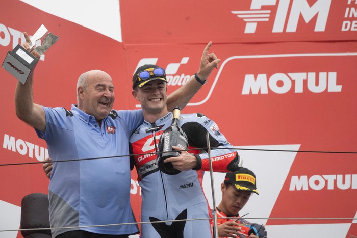 MOTEGI, JAPAN - OCTOBER 06: Manuel Gonzalez (R) of Spain and QJMOTOR Gresini Moto2™
 celebrates the victory on the podium during the Moto2 race during the MotoGP Of Japan - Race at Twin Ring Motegi on October 06, 2024 in Motegi, Japan. (Photo by Mirco Lazzari gp/Getty Images)