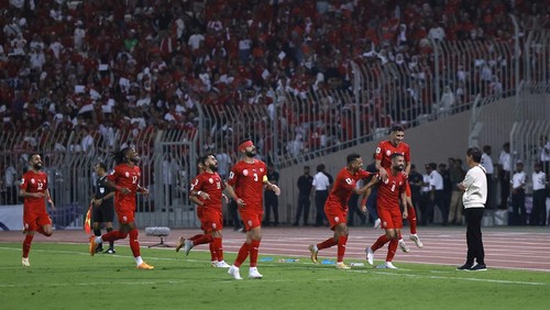 Soccer Football - World Cup - Asian Qualifiers - Third Round - Group C - Bahrain v Indonesia - Bahrain National Stadium, Riffa, Bahrain - October 10, 2024 Bahrains Mohamed Marhoon celebrates scoring their first goal with teammates REUTERS/Hamad I Mohammed