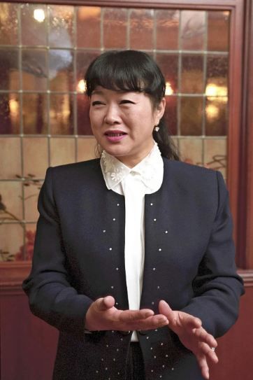 Obit Japan Doraemon Nobuyo Oyama, best known for her raspy voice of Doraemon, the world's beloved cat-robot from the future, speaks during an interview in Feb. 1999, in Tokyo. (Kyodo News via AP)