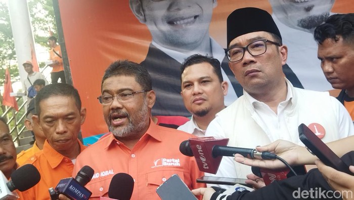 Presiden Partai Buruh Said Iqbal dan Ridwan Kamil. (Kurniawan/detikcom)
