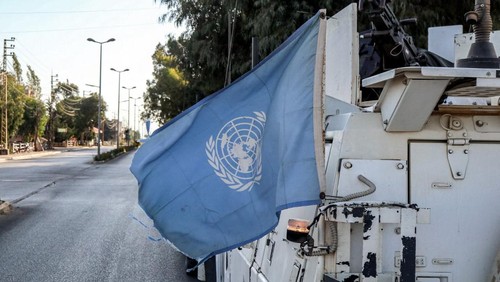 A United Nations flag flies in the back of one of the armoured vehicles of the UN Interim Force in Lebanon (UNIFIL) during a patrol around Marjayoun in south Lebanon on October 8, 2024. (Photo by AFP)