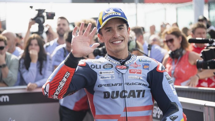 MISANO ADRIATICO, ITALY - SEPTEMBER 22: Marc Marquez of Spain and Gresini Racing MotoGP celebrates the third place under the podium during the MotoGP race during the MotoGP Of Emilia Romagna - Race at Misano World Circuit on September 22, 2024 in Misano Adriatico, Italy. (Photo by Mirco Lazzari gp/Getty Images)